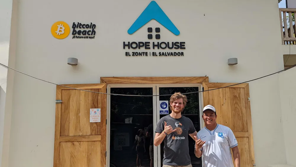 Marco Schneekluth and Jorge Valenzuela in front of the Bitcoin Hope House